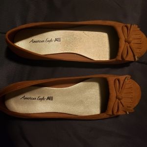 Brown loafer flats